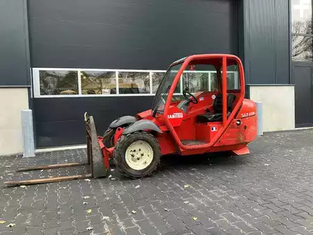 Empilhador telescópico-Fixo 2003  Manitou SLT 415 E (1)