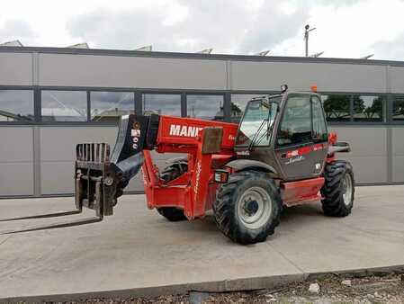 Teleskoptruck fast bom 2004  Manitou MT1340 (1)