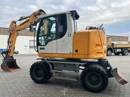 Pelle sur pneus 2019 Liebherr A 910 C Litronic / 2.381h / SW33 (7)