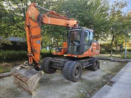 Doosan DX140W