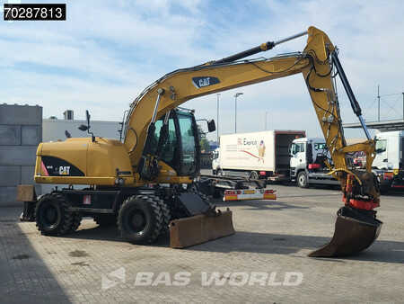Escavadora de rodas 2007 Caterpillar M313 D OUTRIGGERS + BLADE (10)