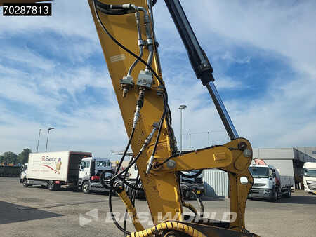 Escavadora de rodas 2007 Caterpillar M313 D OUTRIGGERS + BLADE (14)