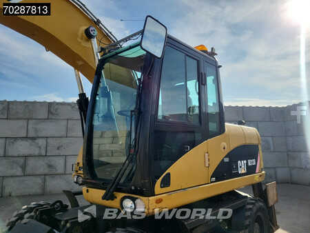 Escavadora de rodas 2007 Caterpillar M313 D OUTRIGGERS + BLADE (25)