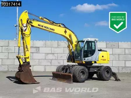 Pelle sur pneus 2007 New Holland Construction MH 5.6 Outriggers + Blade (1)