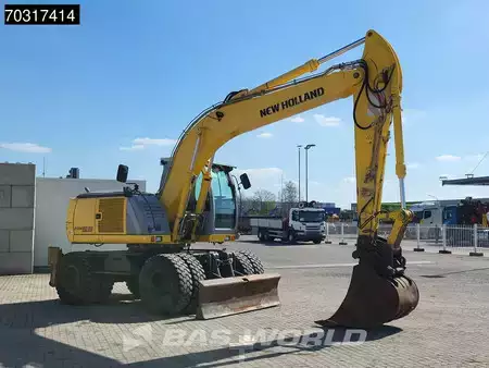 Pelle sur pneus 2007 New Holland Construction MH 5.6 Outriggers + Blade (10)