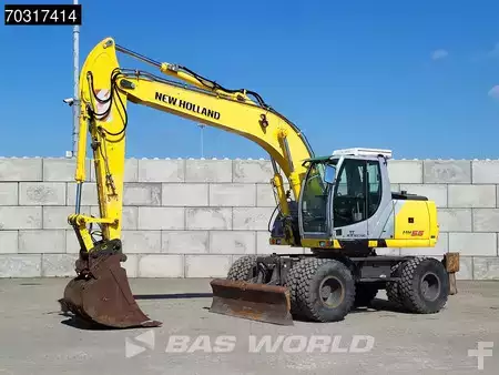 Pelle sur pneus 2007 New Holland Construction MH 5.6 Outriggers + Blade (2)