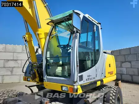 Pelle sur pneus 2007 New Holland Construction MH 5.6 Outriggers + Blade (26)