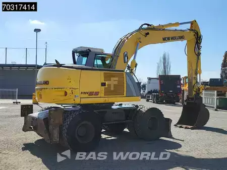 Pelle sur pneus 2007 New Holland Construction MH 5.6 Outriggers + Blade (8)