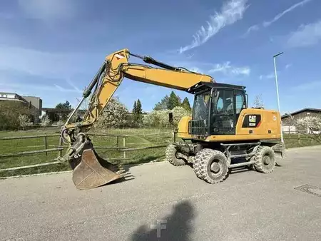 Mobilní bagry 2016 Caterpillar M320F (1)