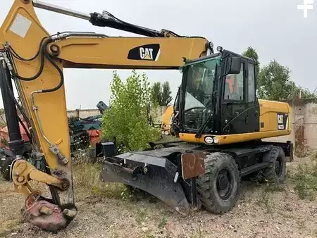 Koparki kołowe 2012 Caterpillar M 322 D (1)