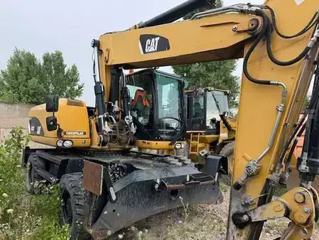 Koparki kołowe 2012 Caterpillar M 322 D (3)