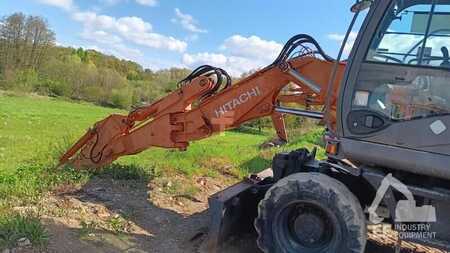 Escavadora de rodas 2009 Hitachi ZX 140 W-3 (1)