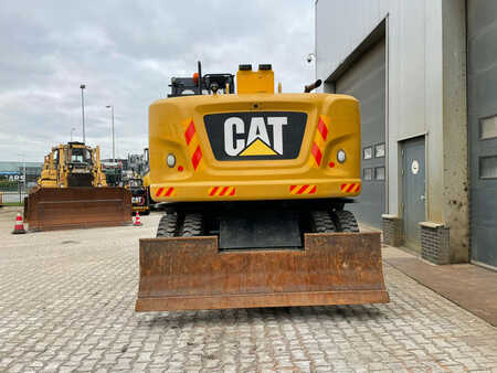 Caterpillar M314F with Outriggers