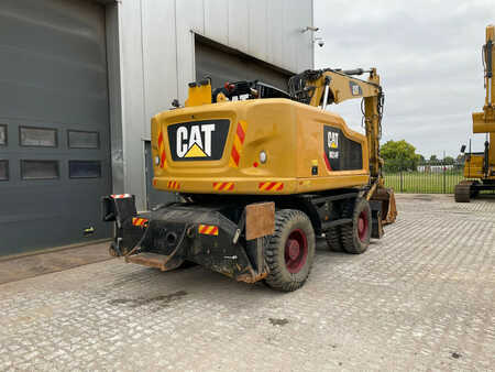 Caterpillar M314F with Outriggers