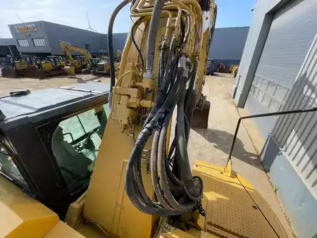 Rupsgraafmachines 2012 Caterpillar 328D (29)