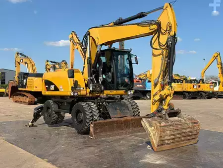 Mobil gravemaskin 2012 Caterpillar M313D VA - Outriggers + Blade (10)