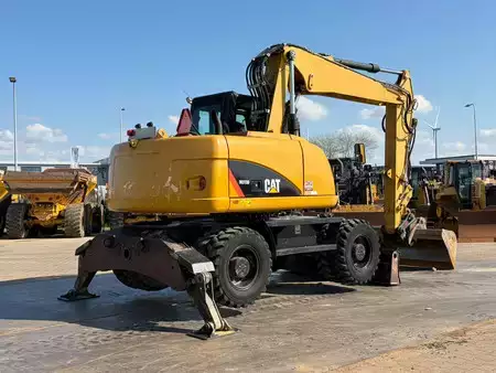 Mobil gravemaskin 2012 Caterpillar M313D VA - Outriggers + Blade (11)