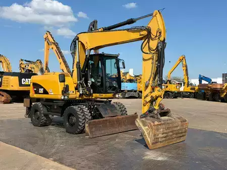 Mobil gravemaskin 2012 Caterpillar M313D VA - Outriggers + Blade (7)