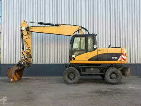Mobiele graafmachines 2005 Caterpillar M316D (1)