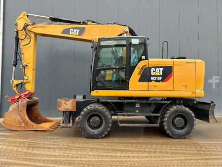 Escavatori gommati 2015 Caterpillar M318F (2)