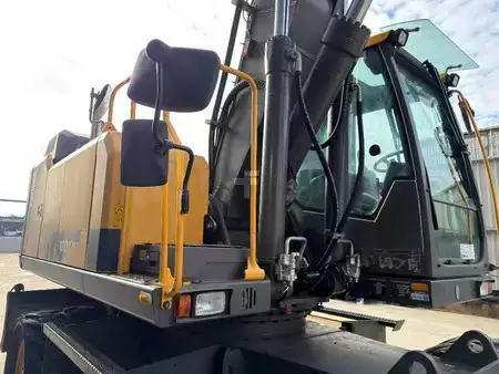 Pelle sur pneus 2015 Volvo EW180E (7)