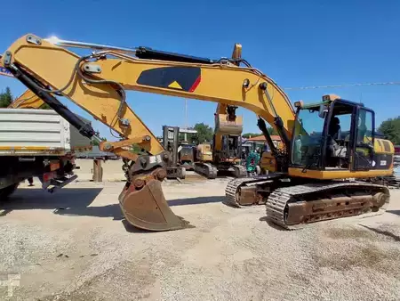 Korečková rýpadla 2009 Caterpillar 323D (1)
