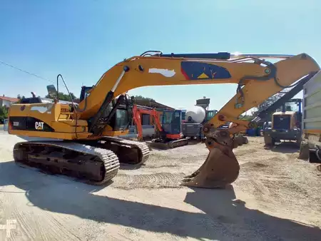 Korečková rýpadla 2009 Caterpillar 323D (2)