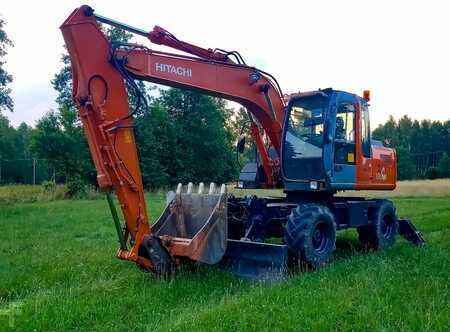 Escavatori gommati 2005 Hitachi ZX130W (1)