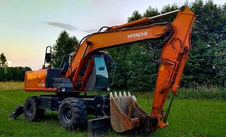 Escavatori gommati 2005 Hitachi ZX130W (2)