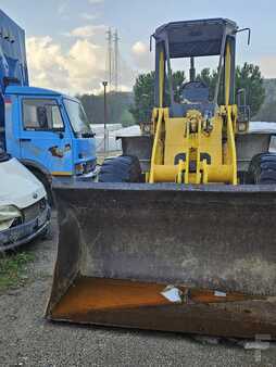 Ładowarki kołowe 2004 Komatsu WA180 (3)