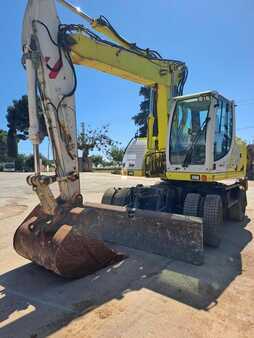 Pelle sur pneus 1901 New Holland Construction MH CITY (1)