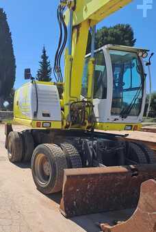Pelle sur pneus 1901 New Holland Construction MH CITY (2)