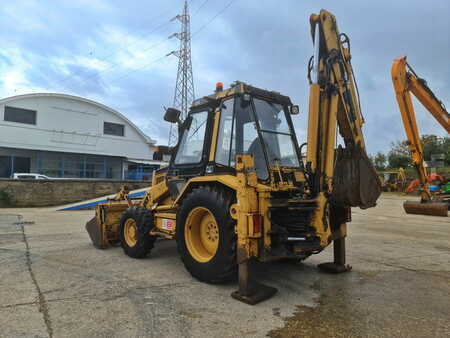 Koparko - Ładowarki sztywne 1992 Caterpillar 428 (2)