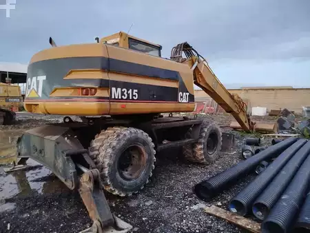 Mobilní bagry 1999 Caterpillar M315 (10)