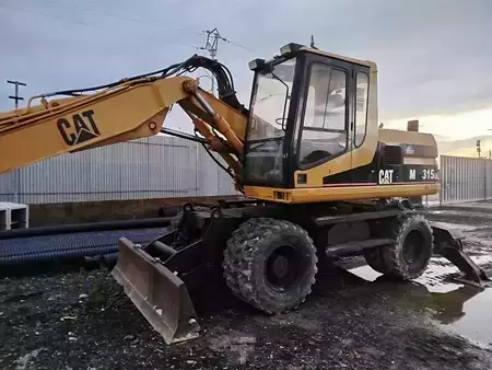 Mobilní bagry 1999 Caterpillar M315 (9)