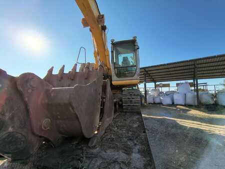 Beltegraver 2007 New Holland Construction E145 (2)