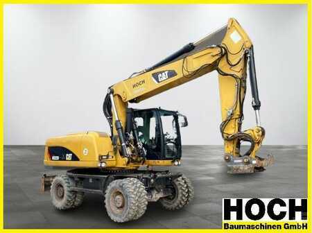 Mobilní bagry 2012 Caterpillar M322D Mobilbagger OilQuick OQ70/55 TOP (1)