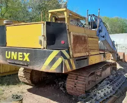 Rupsgraafmachines 0 Unex DH 421 (1)