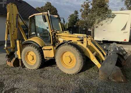 Koparko - Ładowarki sztywne 2003 Komatsu WB 97 S2 (2)