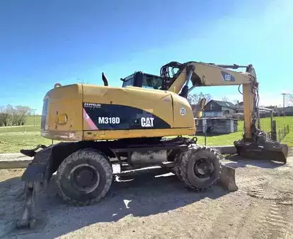 Koparki kołowe 2009 Caterpillar M 318 D (1)