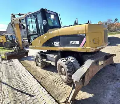Koparki kołowe 2009 Caterpillar M 318 D (9)