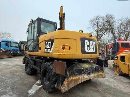 Pelle sur pneus 2014 Caterpillar 313D (11)