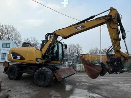 Pelle sur pneus 2014 Caterpillar 313D (14)