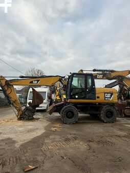 Pelle sur pneus 2014 Caterpillar 313D (18)