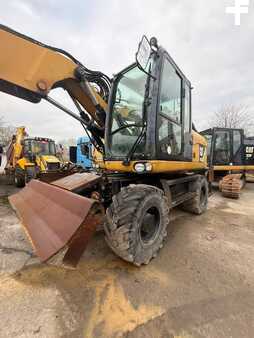 Pelle sur pneus 2014 Caterpillar 313D (19)