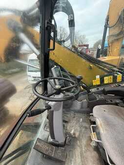 Pelle sur pneus 2014 Caterpillar 313D (2)