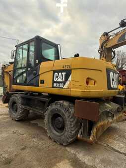 Pelle sur pneus 2014 Caterpillar 313D (3)