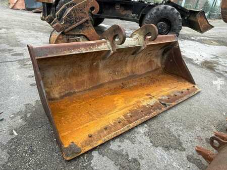 Pelle sur pneus 2014 Caterpillar 313D (4)