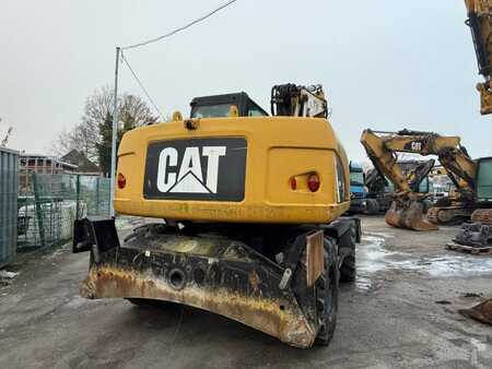 Pelle sur pneus 2014 Caterpillar 313D (7)