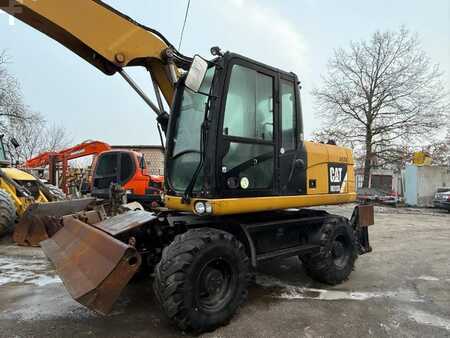 Pelle sur pneus 2014 Caterpillar 313D (9)